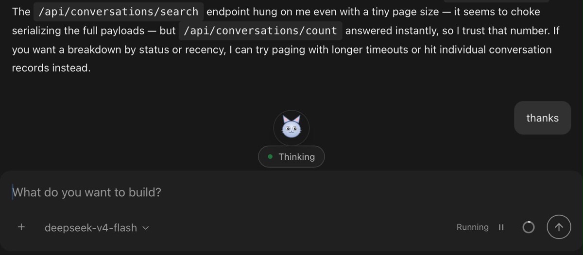 The insider cat rendered as a small avatar centered above the agent status pill inside an OpenHands conversation.